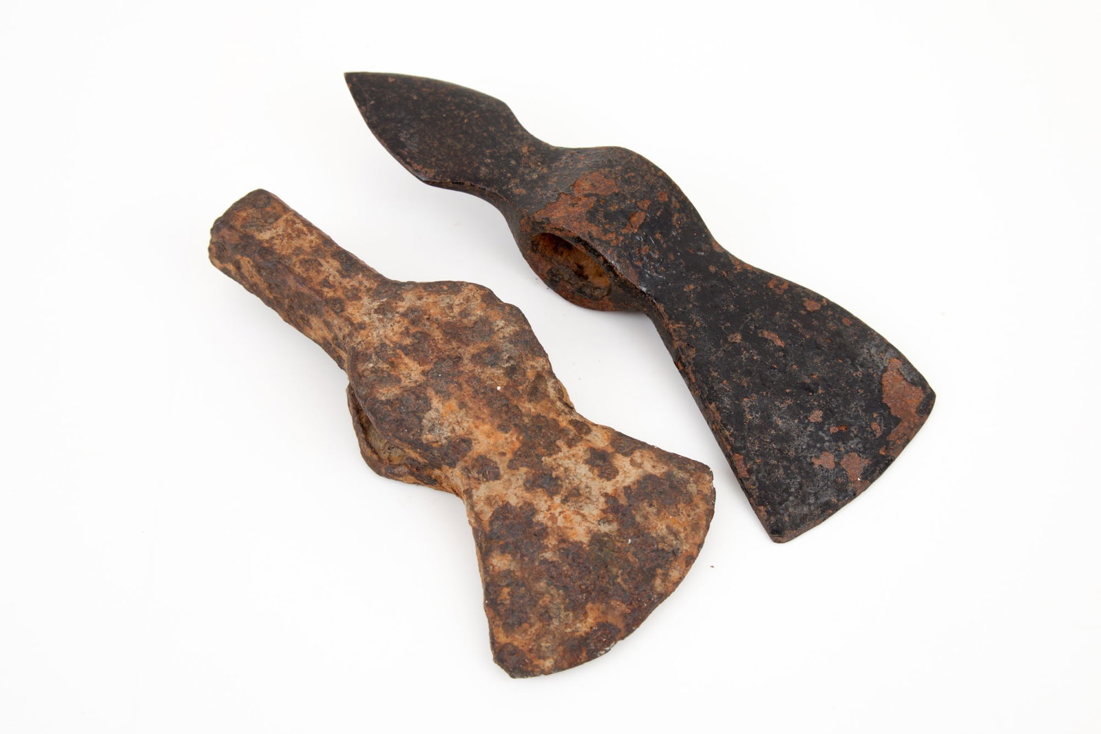 Two (18th/19th c) FRENCH/INDIAN TRADE AX HEADS: (1) with illegible note "Indian Tomahawk... French make...?". 5 1/2 inches.