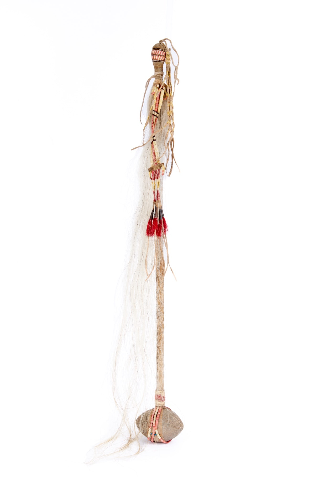 PLAINS INDIANS STONE HEAD WAR CLUB with QUILLWORK: Shaped stone head affixed to a rawhide wrapped wooden shaft with polychrome quillwork & horsehair tassels. 30 1/4 inches.