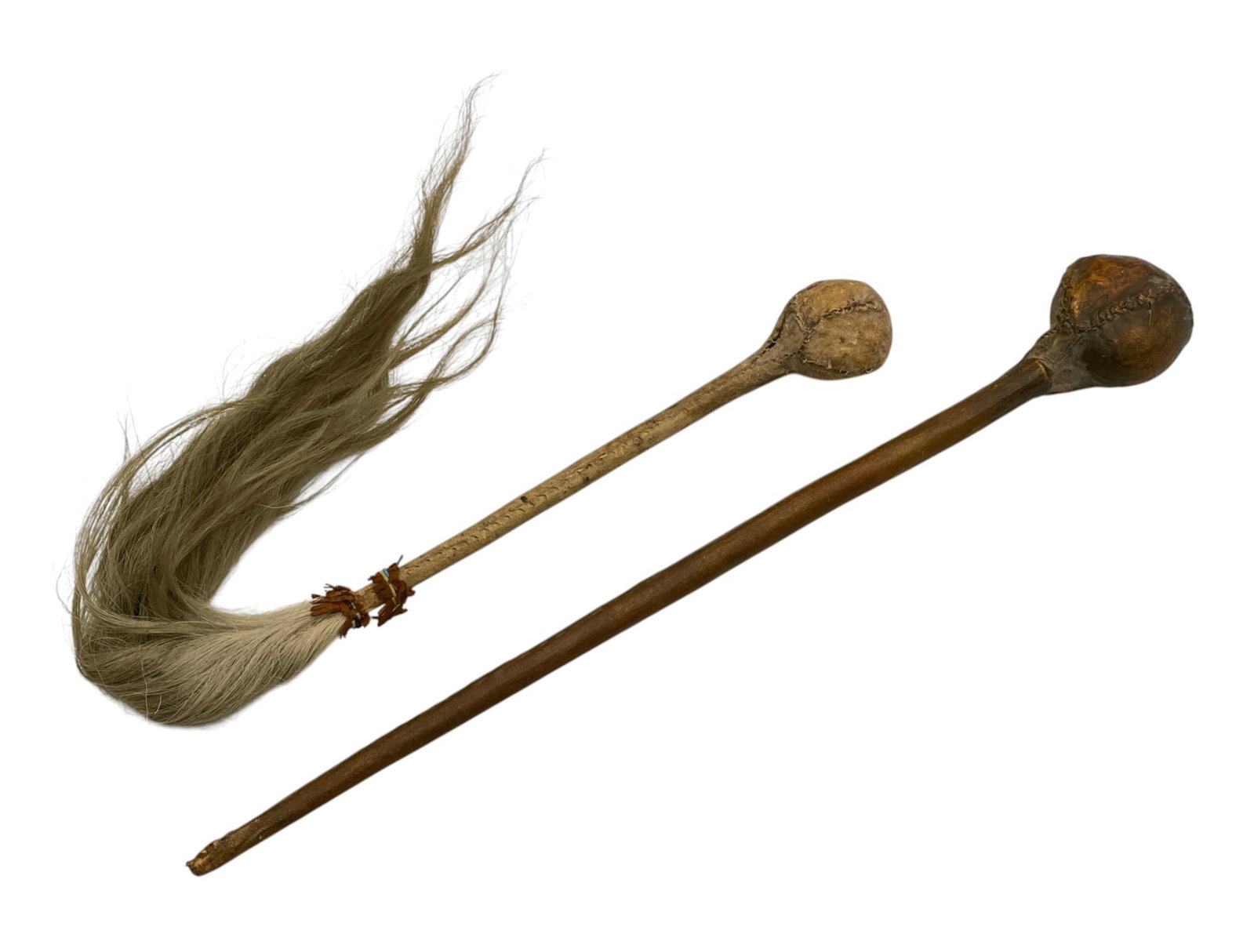 (2) PLAINS INDIANS STONE HEAD WAR CLUBS: Rawhide wrapped wooden handles with stone heads sewn into rawhide, some beadwork, silver horsehair tassel. 22 inches.