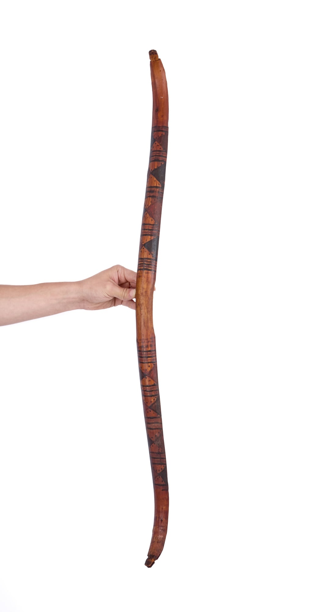 PLAINS INDIANS PAINT DECORATED BOW: Plains Indians wooden bow painted with contrasting red & black bands and inverted double diamonds (possibly Crow). 38 inches.