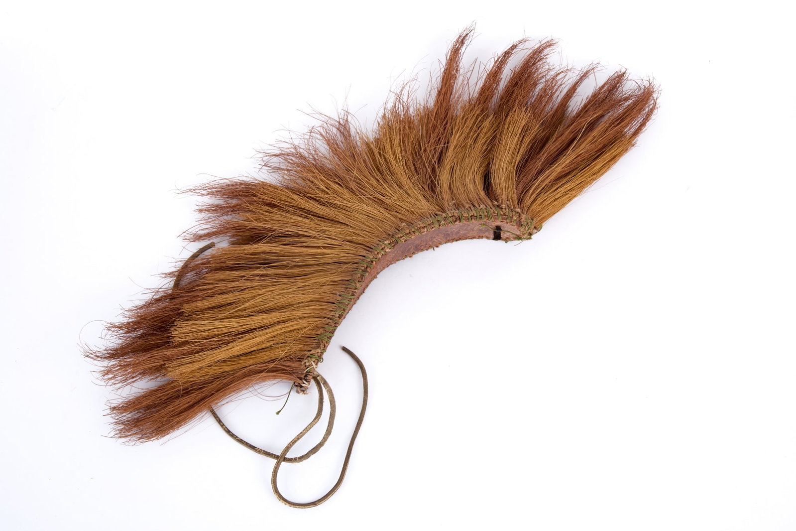 NATIVE AMERICAN ROACH HEADDRESS: Contrasting brown & blonde horse hair on leather base. 6 x 19 inches.