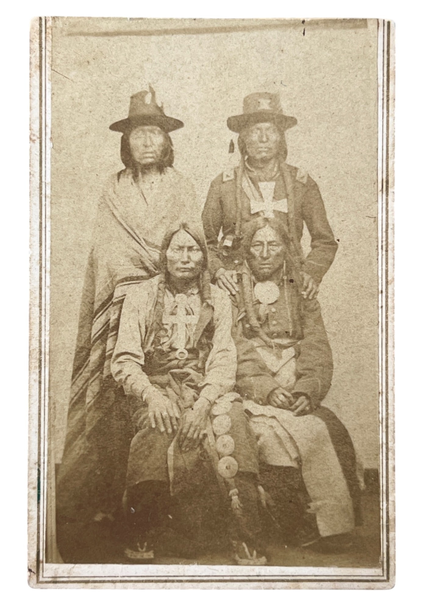 KIOWA INDIANS CABINET CARD: Cabinet card photographic portrait of (4) Kiowa Indians in Union Army regalia. 3 3/4 x 2 1/2 inches.