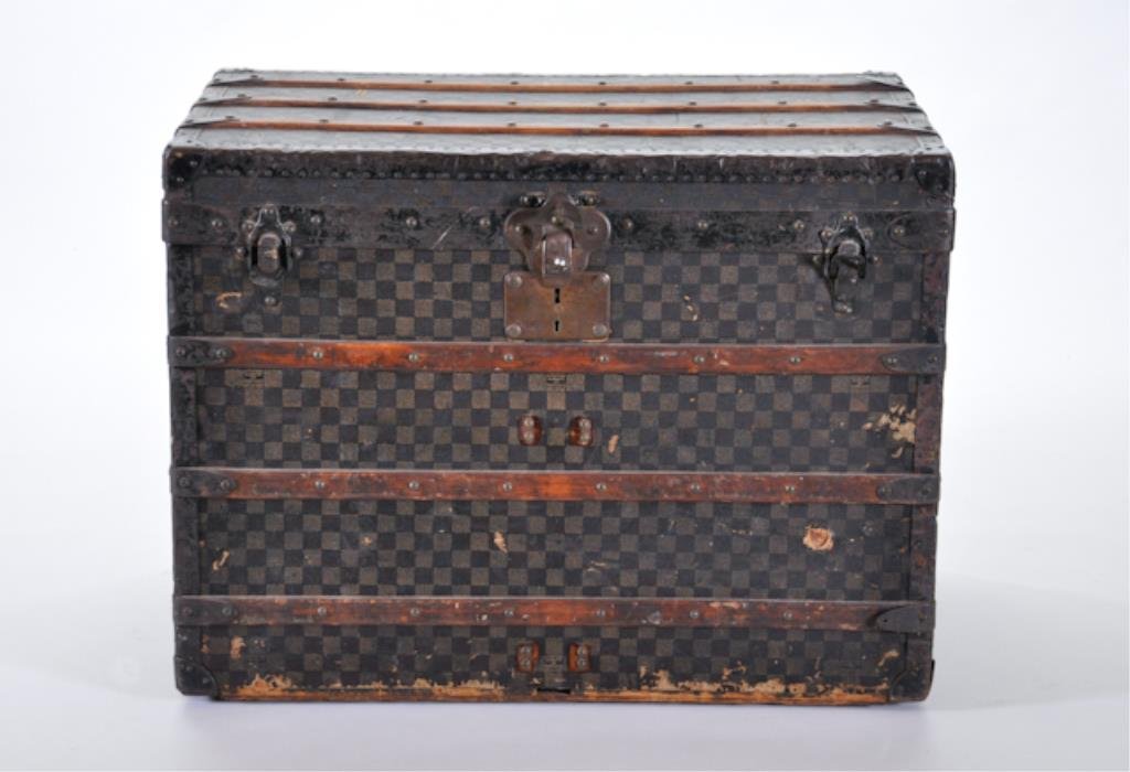 (19th c.) Louis Vuitton Trunk: L. Vuitton Marquee de Fabric. Checkered canvas and wood straps. All original metal handles, buckles and locks. Stamped, Rue Scribe Paris London. Made in France 02625. 22 1/2 x 30 x 19 1/2 inches. Cond
