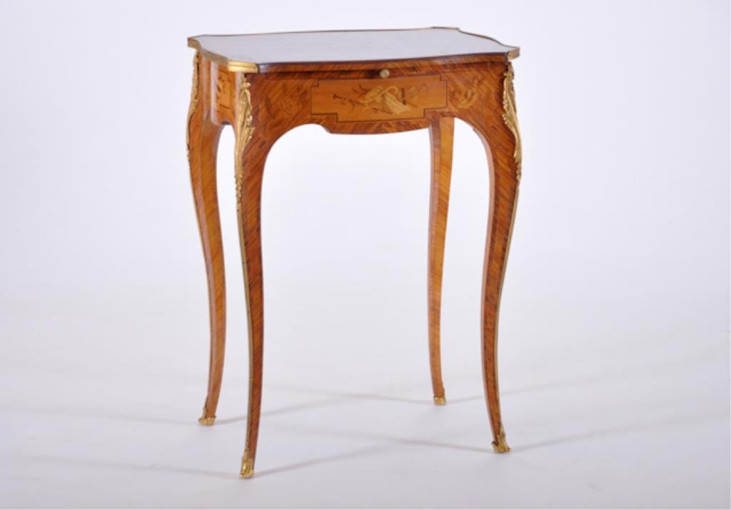 French One-Drawer Writing Table: (Late 19th c.) French one-drawer writing table with very elaborate marquetry details and gilt bronze ormolu trim, 28 x 20 1/4 x 14 inches Condition: Good