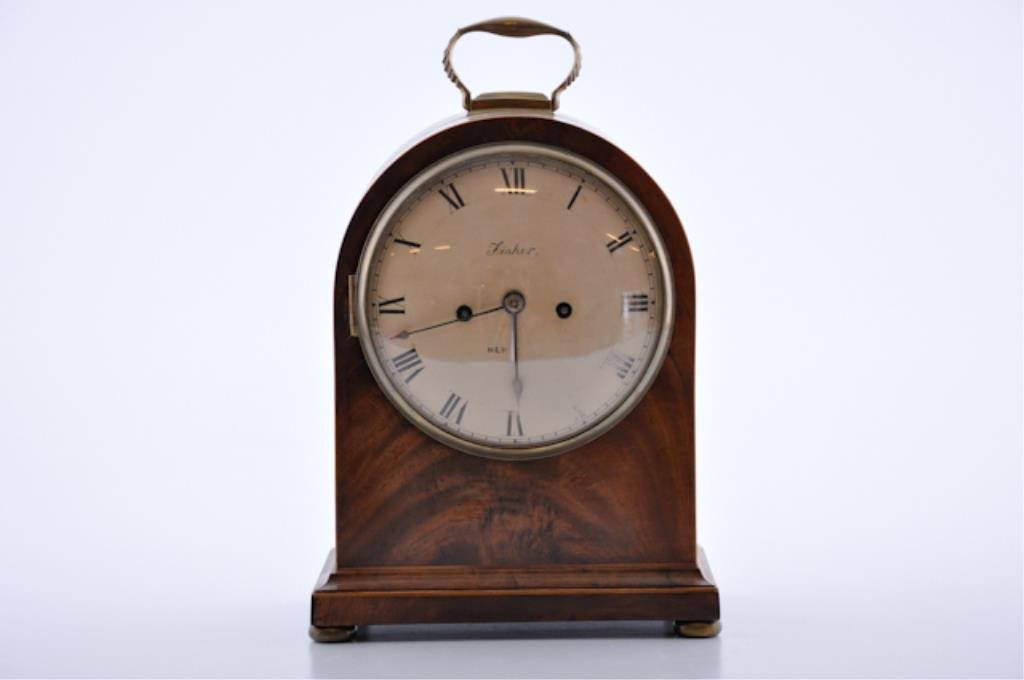 (Early 19th c.) Bracket Clock: With fusee movement. Convex painted dial signed Fisher. Brass bezel satin wood line inlays with engraved brass backplate. Condition: Good. Clean
