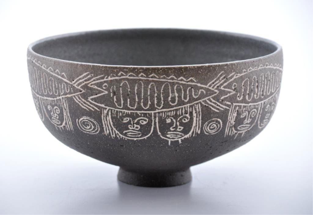 Edwin and Mary Scheier: Beautifully graffito decorated with (12) figures and (8) fish surrounding evenly turned footed bowl. 4 x 7 1/4 inches Condition: Good