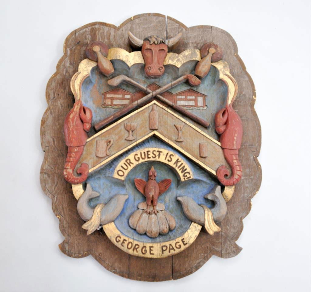 G.A. Goddard (20th c.): "George Page, Our Guest is King" Golf Club Sign. Carved and painted oak. signed G.A. Goddard, Nahant, MA. 31 1/2 x 25 inches. Condition: Cracks along grain