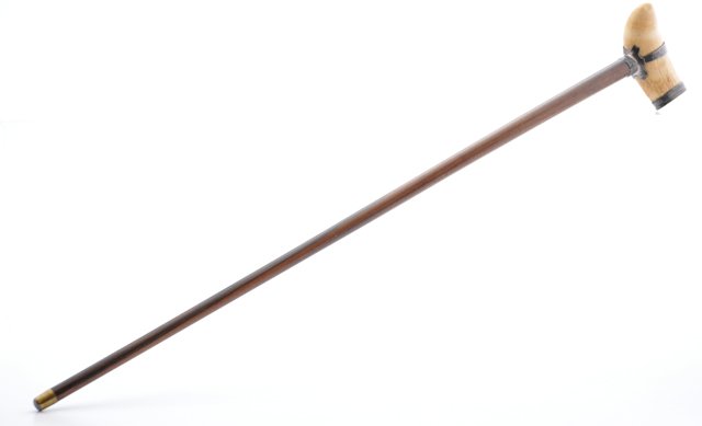 Important (19th c.) Walking Stick: Rare rosewood walking stick with silver-strapped whales tooth handle. A touch-marked silver-lidded snuff box is set into the base of the tooth. 35 7/8 inches (length) with a 5 1/4 inch tooth (length) 
