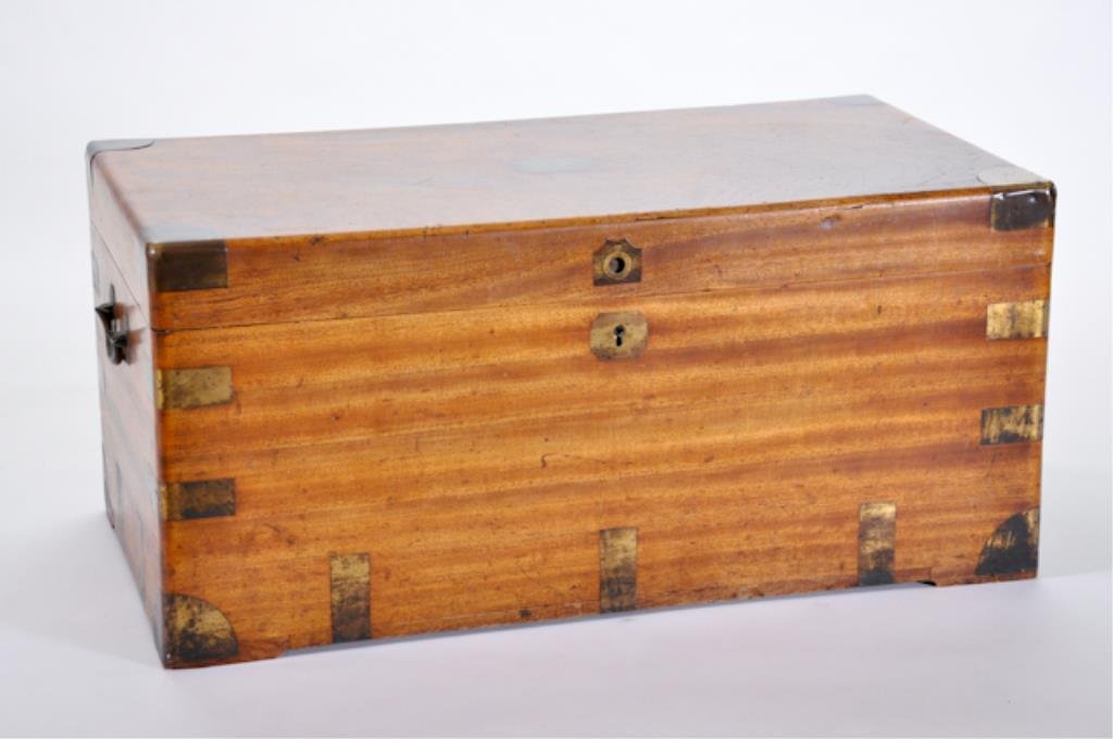 Camphor Wood Chest: The rectangular case, having brass bound corners and a recessed pull top. The sides, mounted with twin brass handles.Measures: 17"h x 35 1/2"w x 19"d. Condition: In fair condition; refinished with som