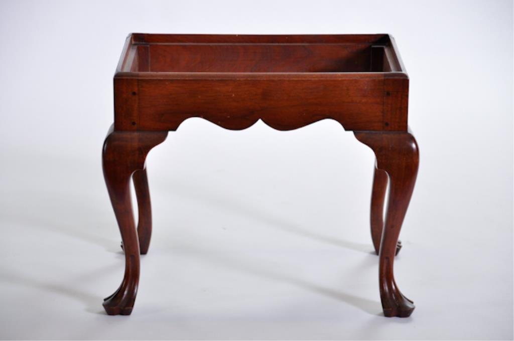 Centennial Footstool: Nicely shaped Chippendale-style stool with slip seat and trifid feet. 18 x 22 x 17 1/2 inches. Condition: Good