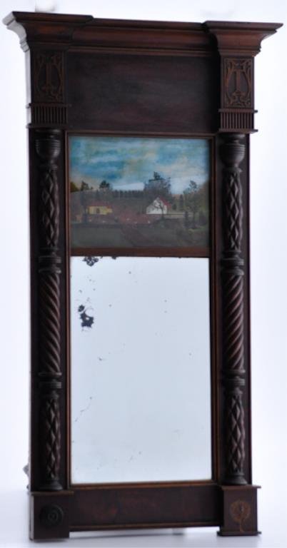 (19th c.) Two-Part Mahogany Mirror: American Sheraton carved two-part mahogany mirror (second quarter of the 19th c.). Upper glazing fitted with an eglomise glass panel, depicting a farm, above a rectangular glazed mirror, centered by s