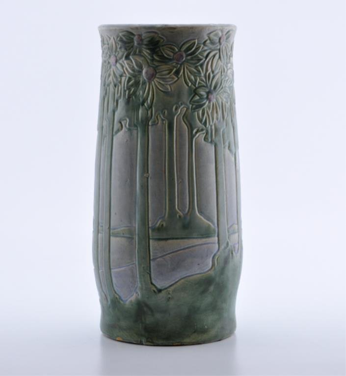 Arts and Crafts Pottery Umbrella Stand: Palm motif in typical period muted blues and greens with purple fruit. 19 1/2 inches (height) Condition: Good