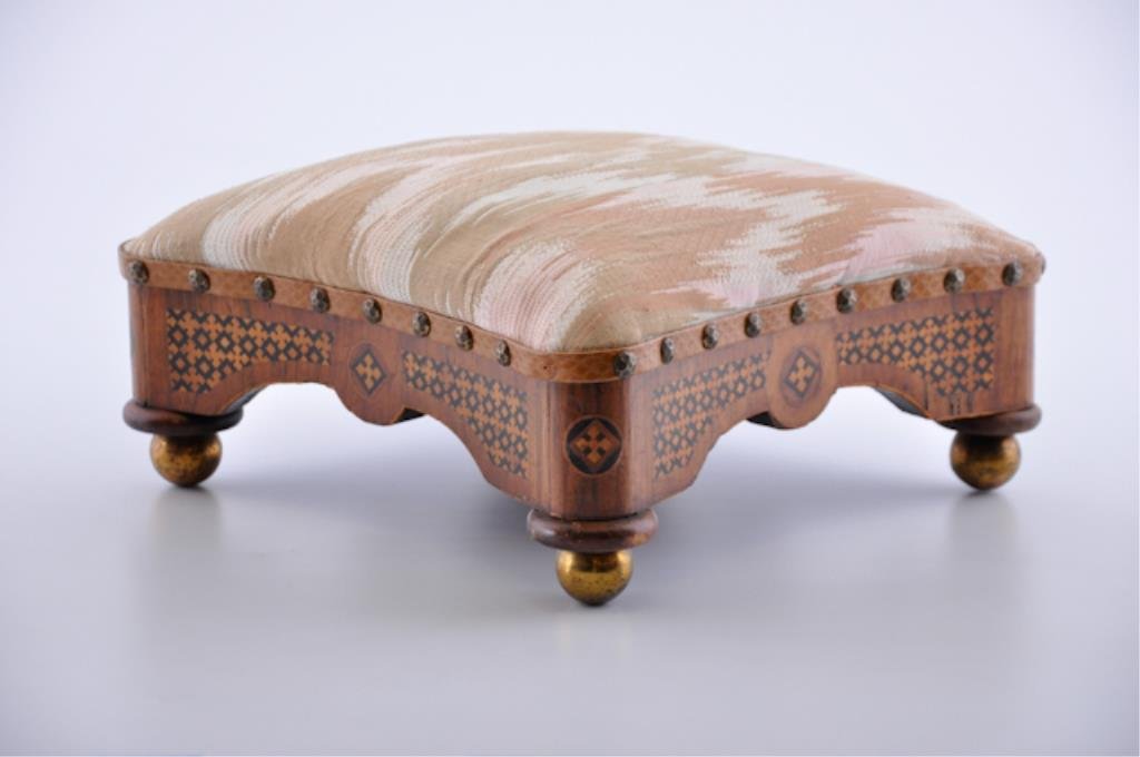 (19th c.) Victorian Footstool: Convex apron with elaborate marquetry inlay and brass ball feet. 5 x 11 1/2 x 11 1/2 inches Condition: Good