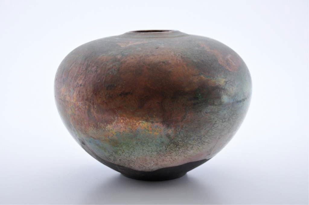 Evans Design Group Modernist Vase: Tony Evans (California) c. 1975 raku ceramic vase in copper, green and red glazes. 10 x 14 inches. signed Evans raku and 75? on foot. Condition: Good