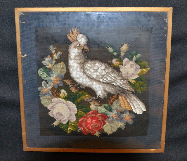 Needlepoint and Beadwork Panel: (Mid-19th c.) English Victorian panel depicting a cockatoo within a wreath of roses. 17 1/2 x 17 1/2 inches. Condition: Fair