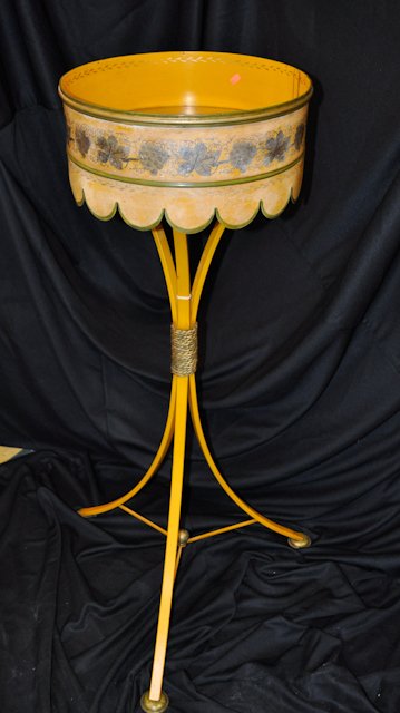 (20th c.) Tole Painted Plant Stand: Modern Italian toleware plant stand with gallery border and gilt stenciled grape and vine decoration. 43 1/2 x 15 1/4 inch (diameter) Condition: Good