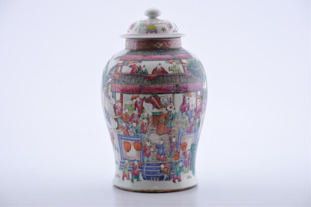 (Late 19th c.) Chinese Covered Jar: Chinese polychrome covered jar on white ground with figures in a garden house watching a procession including dragon kites. 17 inches (height) Condition: Good; replaced lid