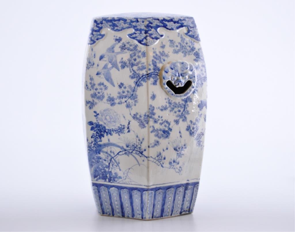 Chinese Blue and White Garden Barrel: Hexagonal form with foo dog pierced handles. Decorated with flowers, birds, clouds. Traditional blue and white glaze. 19 inches (height) Condition: Good