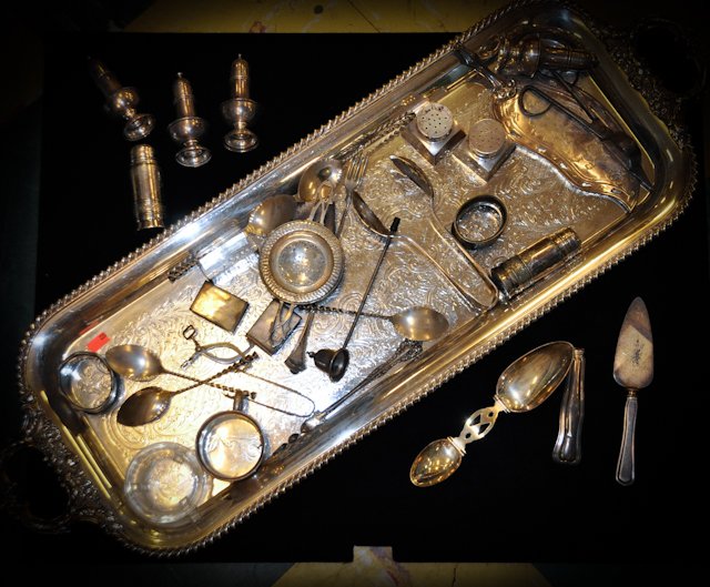 Misc. Sterling Silver Articles: Group of misc. sterling silver items include a single handle baby cup, a set of four Georgian-style salt shakers, a pair of square salt and pepper shakers, a pair of match covers (each monogrammed, "B
