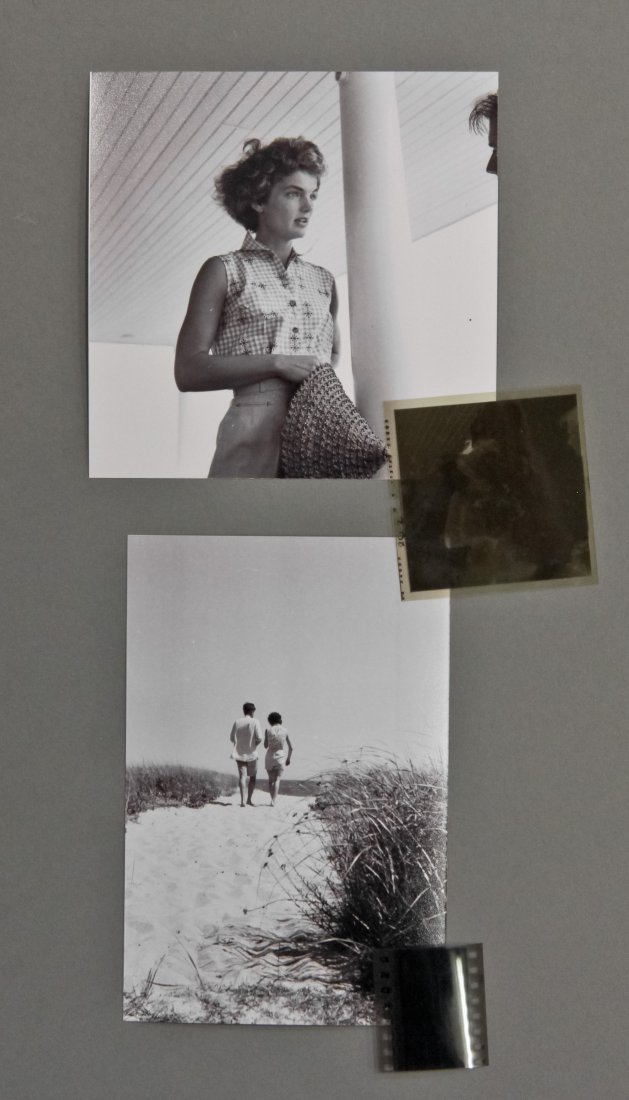 Engagement photos: John F. Kennedy & Jackie: (2) Hy Peskin (1915-2005) photographs: (1) negative and photograph reprint of Jackie standing on porch, (1) negative and photograph reprint of John F. Kennedy and Jackie walking on beach path. From a