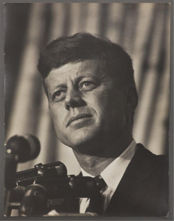 Photograph of John F. Kennedy at the DNC: (1) Large format photograph of John F. Kennedy, 13 3/4 x 10 3/4 inches, stamped "photo by Bill Bridges, Beverly Hills", taken at the Democratic National Convention in Los Angeles 1960.