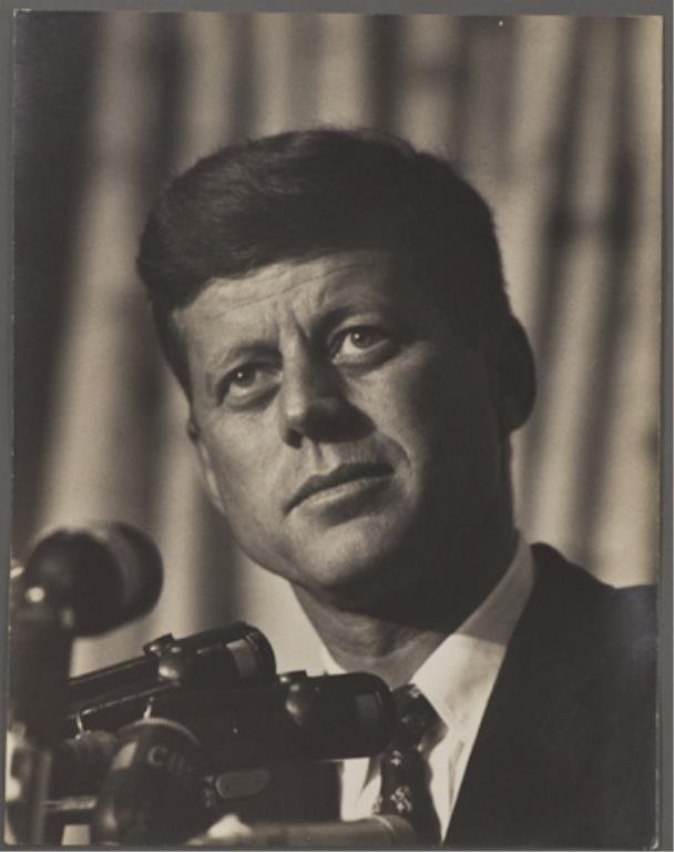 Photograph of John F. Kennedy at the DNC: (1) Large format photograph of John F. Kennedy, 13 3/4 x 10 3/4 inches, stamped "photo by Bill Bridges, Beverly Hills", taken at the Democratic National Convention in Los Angeles 1960.