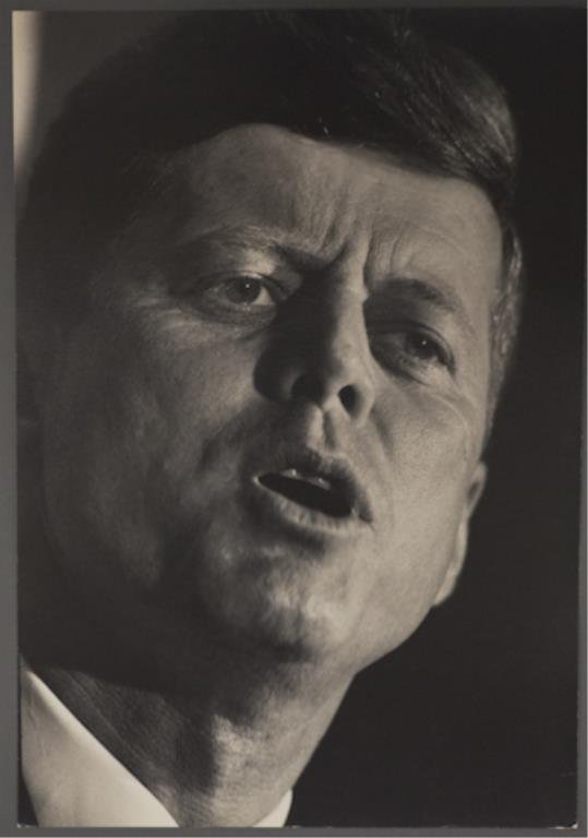 Photograph of John F. Kennedy at the DNC: (1) Large format photograph of John F. Kennedy, 13 3/4 x 9 1/2 inches, stamped "photo by Bill Bridges, Beverly Hills", taken at the Democratic National Convention in Los Angeles 1960.