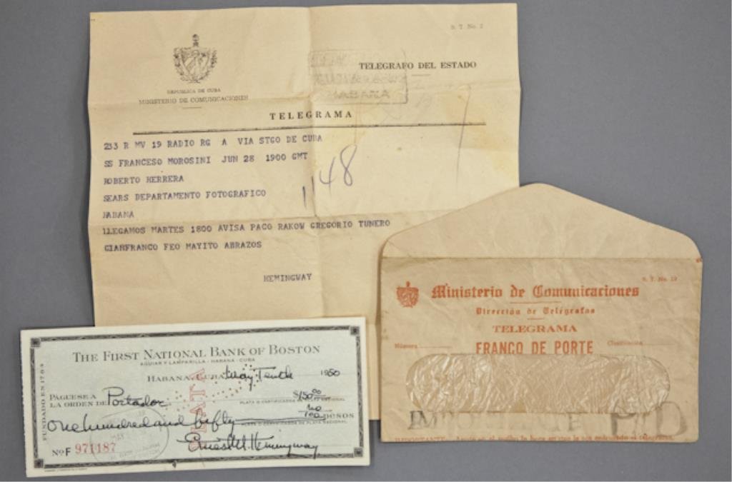 Hemingway Telegram and Signed Check: (1) Bank check filled out and signed in ink "Ernest M. Hemingway" payable to Portador for $150.00, dated May 10 1950, endorsed "Roberto Herrera", 2 3/4 x 6 3/8 inches. (with expected bank stamps and c