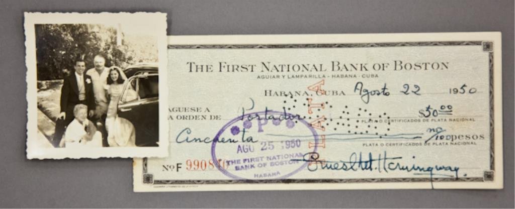 Ernest Hemingway Signed Check: (1) Bank check filled out and signed in ink "Ernest M. Hemingway", payable to Portador for $50.00, dated Agosto 22 1950, endorsed "Roberto Herrera", 2 3/4 x 6 3/8 inches. (with expected bank stamps an