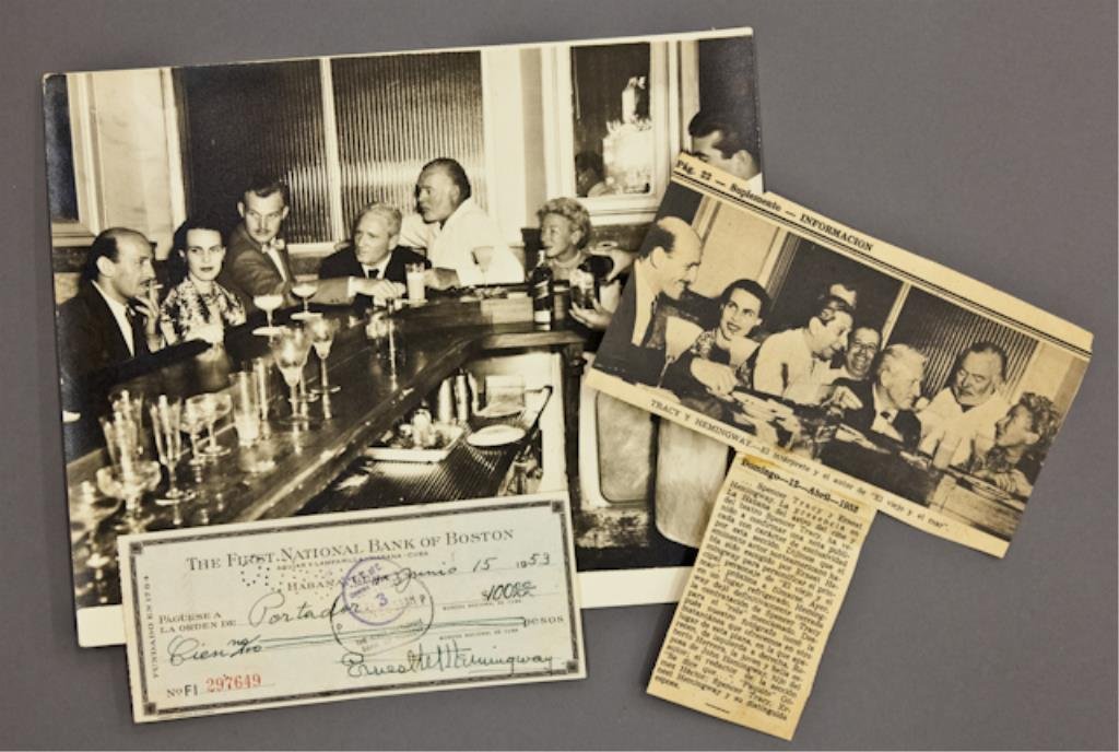 Hemingway Signed Check & Cuba Photograph: (1) Bank check filled out and signed in ink "Ernest M. Hemingway" payable to Portador for $100.00, dated June 15, 1953, endorsed twice, 2 3/4 x 6 3/8 inches. (with expected bank stamps and cancellatio