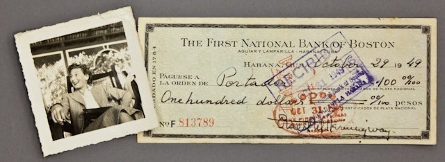 Ernest Hemingway Signed Check: (1) Bank check filled out and signed in ink "Ernest M. Hemingway" payable to Portador for $100.00 dated October 29, 1949, endorsed "Roberto Herrera", 2 3/4 x 6 1/2 inches. (with expected bank stamps a