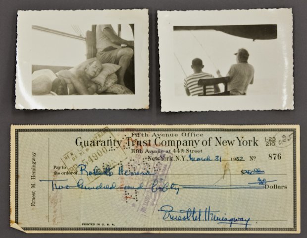 Ernest Hemingway Signed Check: (1) Bank check filled out and signed in ink "Ernest M. Hemingway", payable to Roberto Herrera for $250.00 dated March 31 1952, endorsed with three signatures, 3 1/4 x 8 1/2 inches. (minor foxing, with