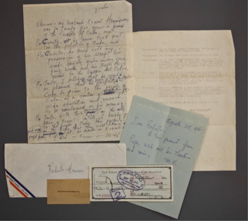 Mary Hemingway Letters/ Signed Check: (1) Bank check filled out and signed in ink "Ernest M. Hemingway" payable to Portador for $200.00 dated October 7 1943, endorsed "Roberto Herrera", 2 3/4 x 6 1/4 inches. (with expected cancellation ho
