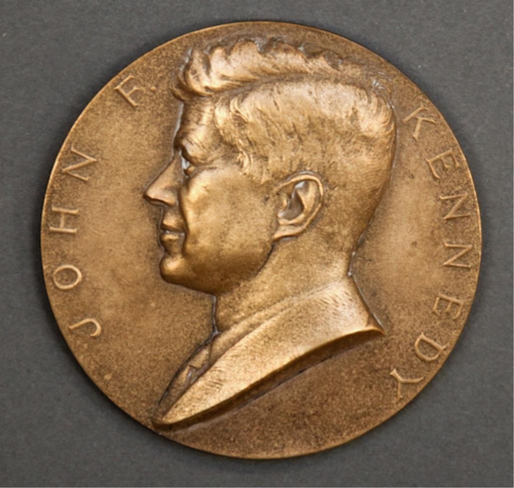 President John F. Kennedy Medal: (1) Bronze medal of John F. Kennedy, U.S. Mint Presidential Series medal designed by Gilroy Roberts, recto, Frank Gasparo, verso, stock medal # 135, 3 inches diameter. (surface grime, wear) Kirk LeMoy