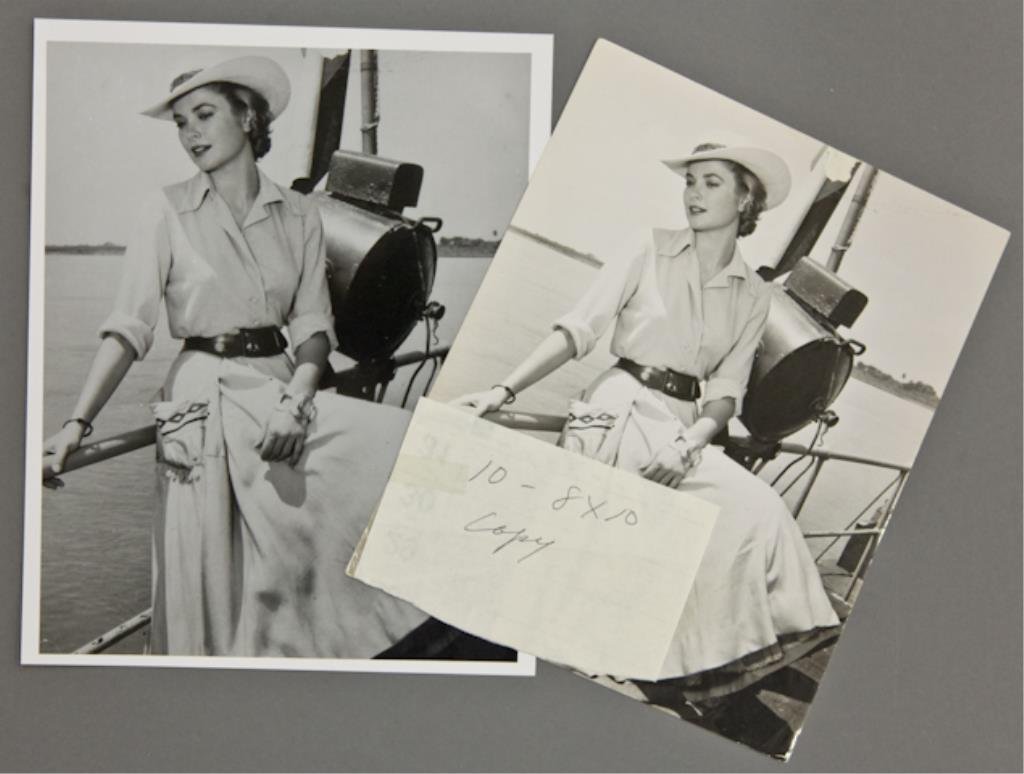 Grace Kelley: (1) 7 x 9 inch photograph of Grace Kelley and (1) 8 x 10 inch photograph reprint; the former a publicity photograph of Pictorial Parade for the promotion of the movie "Mogambo".