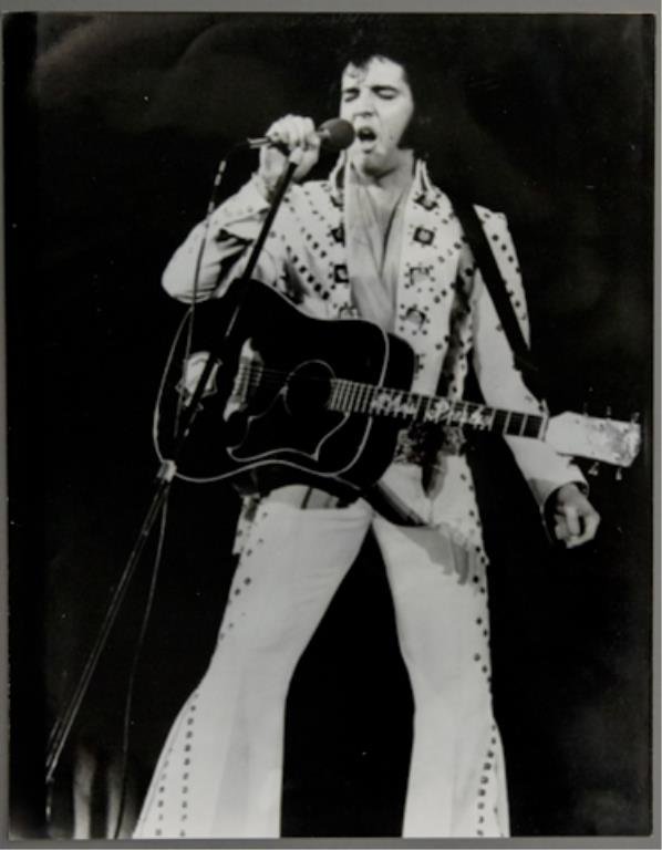 Elvis Presley: (1) 11 x 14 inch photograph reprint of Elvis Presley. Aloha from Hawaii, January 14, 1973.