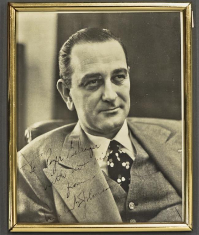 LBJ Signed Photograph: (1) Framed 8 x 10 inch autographed photo of Lyndon Baines Johnson, inscribed in pen "To Roger Belanger with best wishes from Lyndon B. Johnson".