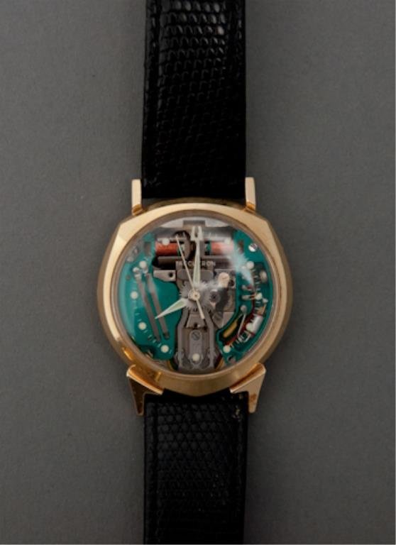 14k Gold 1961 Bulova Spaceview Watch: (1) 14k gold 1961 Spaceview Bulova Accutron Wristwatch with "Grand Lizard Germany" band. (not weigh-able, running condition). *Note: This watch once belonged to Milt Ebbins and was a gift from 5 Star 