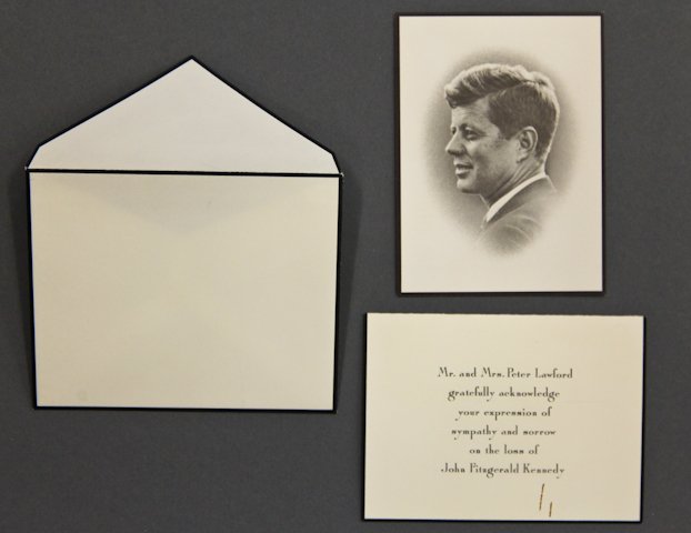 Mr. and Mrs. Peter Lawford Thank You: (1) Unsent engraved thank you card and envelope for those who expressed sympathy and sorrow on the loss of John F. Kennedy. (paperclip stain). (1) John F. Kennedy Mass Card.