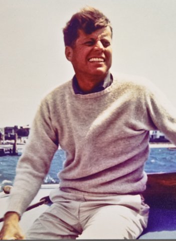 John F. Kennedy File: (1) 8 x 10 Inch color print of John F. Kennedy on boat with negatives, (1) correspondence concerning " Blackie " the puppy given by Khrushchev to Caroline Kennedy, includes letter about vaccination, R