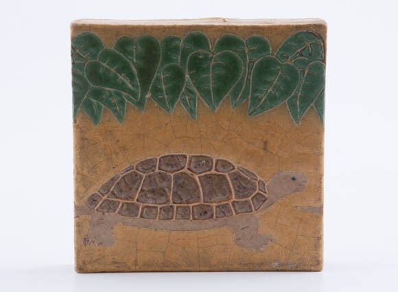 Grueby Pottery Tile: of a turtle, artist signed in white glaze monogram style (RE?),6 " square, condition good with very minor glaze crazing. Condition: See description