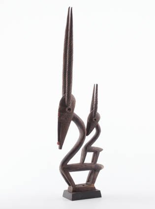 African Carved Sculpture: "Mother and Infant Antelope" carved wood and assembled materials. 32 inches. Condition: Repairs Condition: See description