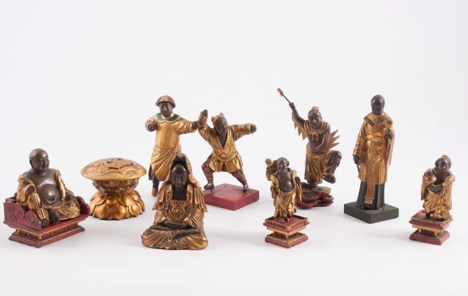 Exceptional Lot of Carved Asian Figures: A variety of carved wood, painted and gilt figures in various poses, tallest being 7". Condition: Wear and losses.