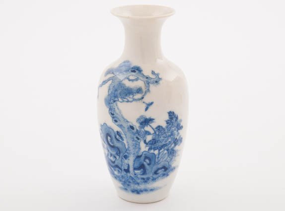 Chinese Blue and White Vase: Decorated with pine and bamboo foliage measures approx. 5 3/4" high. Condition is good.