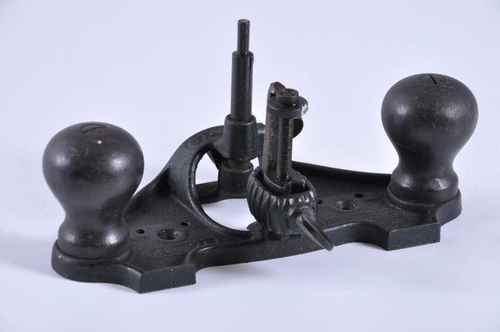 Stanley #71 Open Throat Router Plane: Has a depth gauge attached and grooves in the sole for a fence which is not included with this plane. Light rust on the sole. Condition: good