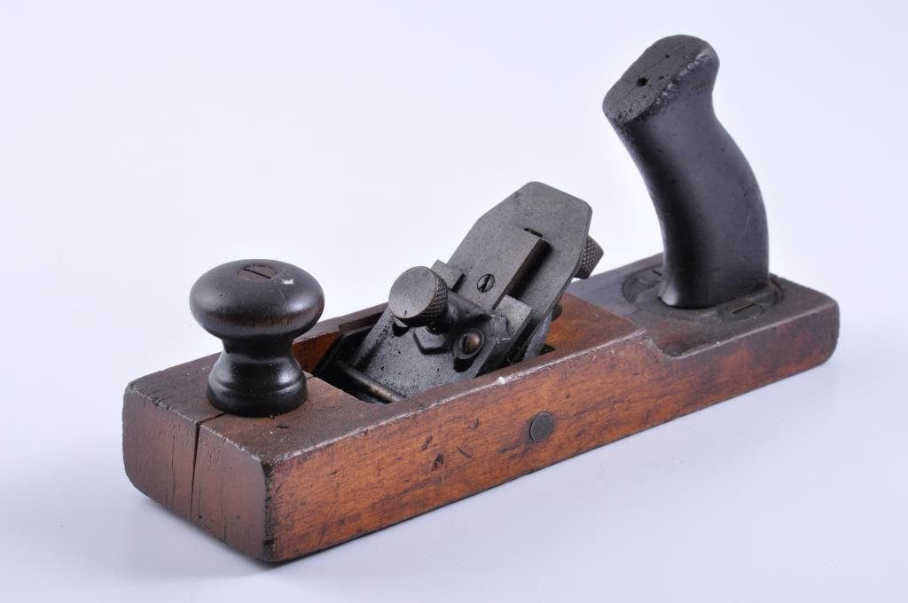 Gage Wood Bottom Plane: 10” x 3” Gage plane by Stanley. The rear handle has some loss. Condition: fair