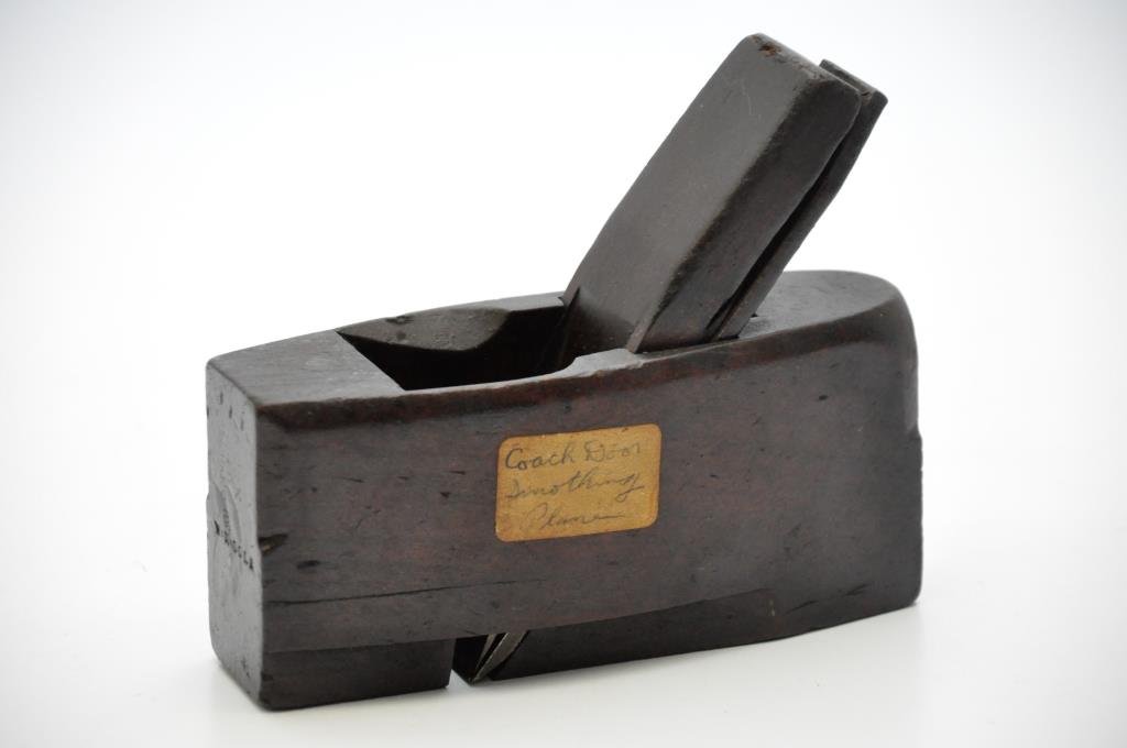 Buck Coach Door Plane: 6 1/4” long, 2 3/4” tall coffin shaped plane, with a mark on the toe 'Buck.' One side of the plane body is flattened to make coach doors. Condition: very good