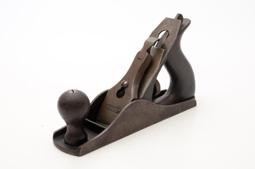 Sargent #4C8 Plane: 9” long iron plane, by Sargent, #4C8 is cast into the body of the plane and also marked on the blade. Condition: very good