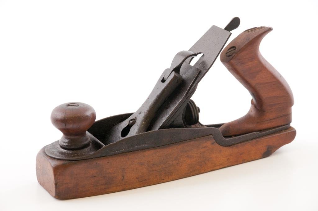 Stanley Plane: 10” long unmarked wood bottom plane. Rare handle is cracked. Condition: poor