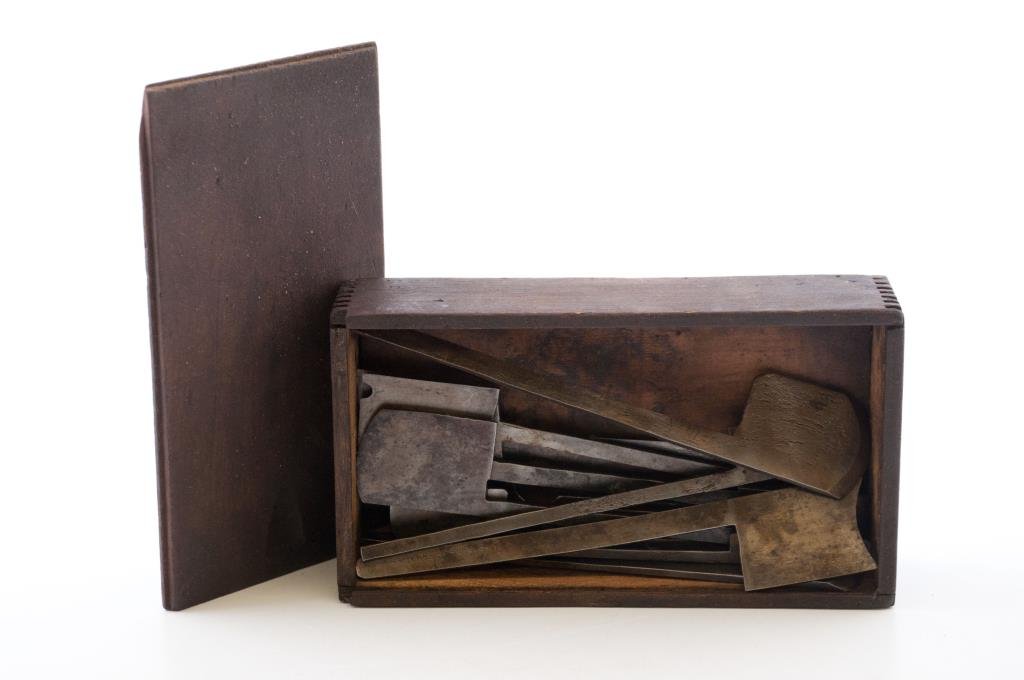 Wooden Box of Plane Irons: 14 early plane irons. Some are marked. Condition: good